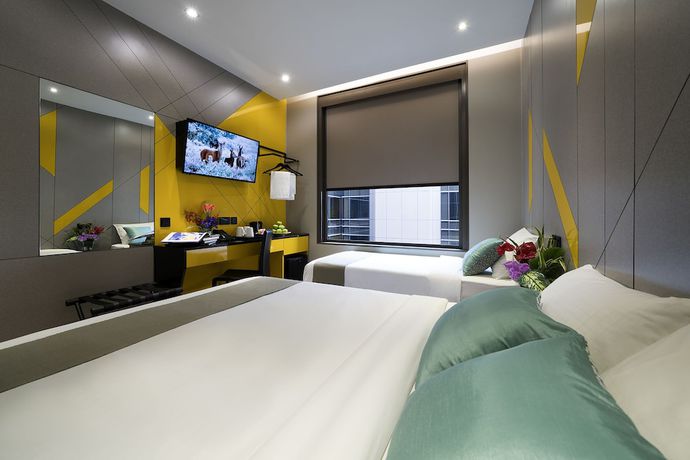 Imagen de la habitación del Hotel Mi Bencoolen. Foto 11