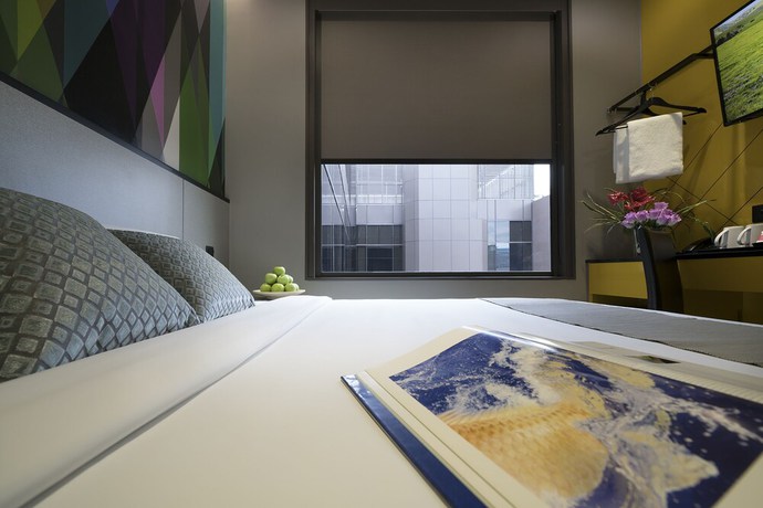 Imagen de la habitación del Hotel Mi Bencoolen. Foto 15