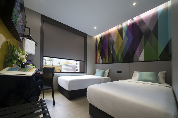 Imagen de la habitación del Hotel Mi Bencoolen. Foto 17