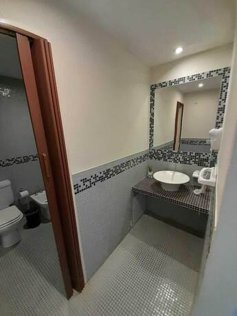 Imagen de la habitación del Hotel Mi Espacio Sur. Foto 20