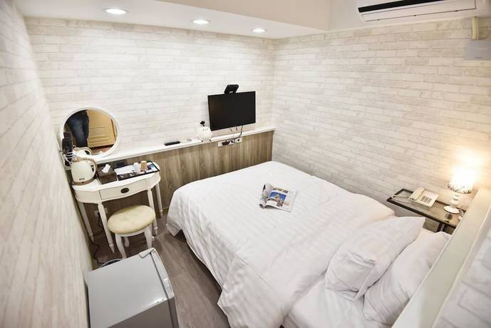 Imagen de la habitación del Hotel Mi Ge Business. Foto 9