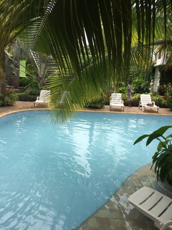 Imagen de la piscina del Hotel Mi Paraiso and Resort. Foto 18