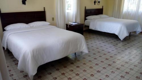 Imagen de la habitación del Hotel Mi Ranchito. Foto 7