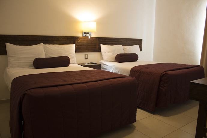 Imagen de la habitación del Hotel Mi Solar Ejecutivo. Foto 5
