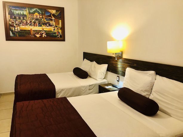 Imagen de la habitación del Hotel Mi Solar Ejecutivo. Foto 7