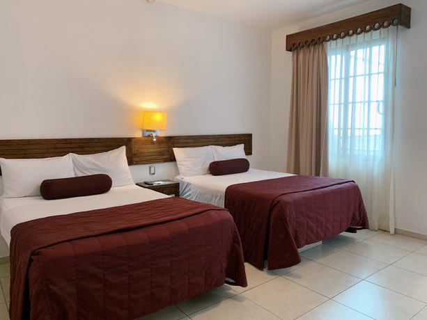 Imagen de la habitación del Hotel Mi Solar Ejecutivo. Foto 10