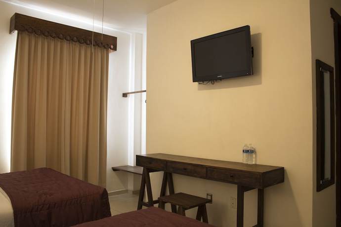 Imagen de la habitación del Hotel Mi Solar Ejecutivo. Foto 13