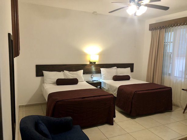 Imagen de la habitación del Hotel Mi Solar Ejecutivo. Foto 14