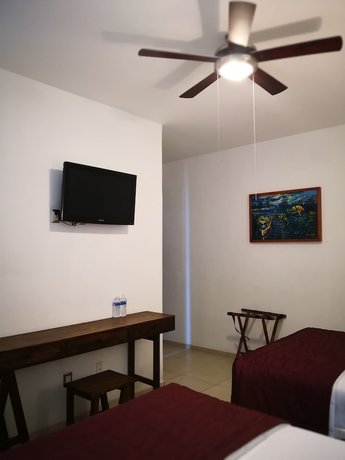 Imagen de la habitación del Hotel Mi Solar Ejecutivo. Foto 15