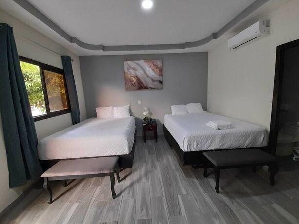 Imagen de la habitación del Hotel Mi Tierra y Restaurante. Foto 16