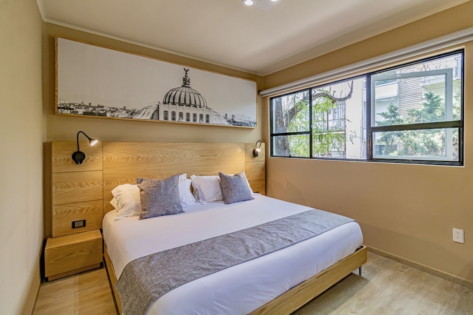 Imagen de la habitación del Hotel Mi Zona Lodging WTC. Foto 5