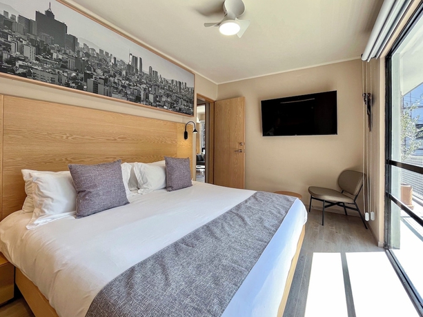 Imagen de la habitación del Hotel Mi Zona Lodging WTC. Foto 7