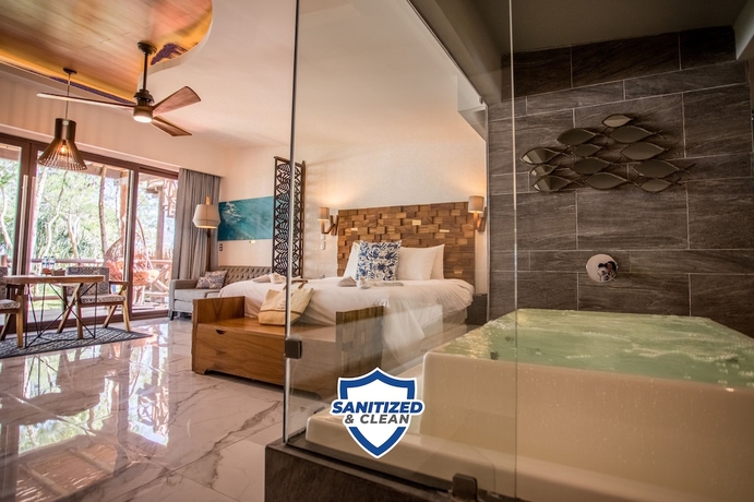 Imagen de la habitación del Hotel Mia Bacalar Luxury Resort and Spa. Foto 5