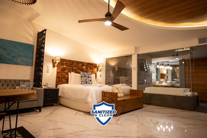 Imagen de la habitación del Hotel Mia Bacalar Luxury Resort and Spa. Foto 8