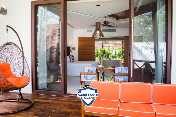 Imagen de la habitación del Hotel Mia Bacalar Luxury Resort and Spa. Foto 17