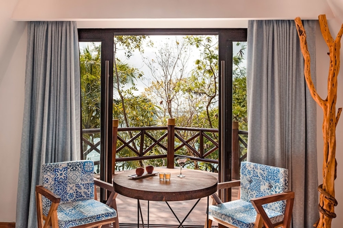 Imagen de la habitación del Hotel Mia Bacalar Luxury Resort and Spa. Foto 18