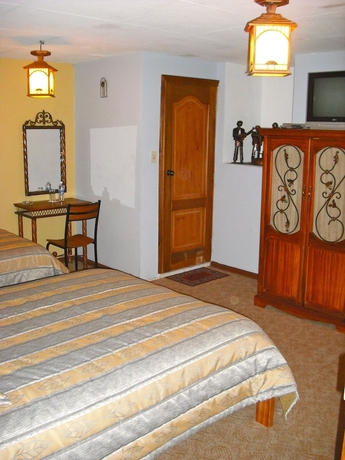 Imagen de la habitación del Hotel Mia Leticia. Foto 6