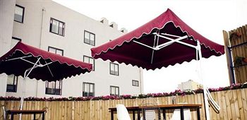 Imagen de los exteriores del Hotel Mianyang Caishe. Foto 15