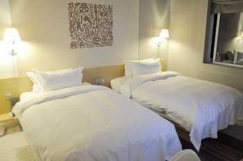 Imagen de la habitación del Hotel Mianyang Caishe. Foto 6