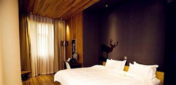 Imagen de la habitación del Hotel Mianyang Caishe. Foto 11