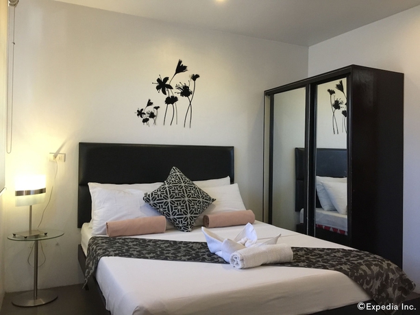 Imagen de la habitación del Hotel Micasa Lodge. Foto 7