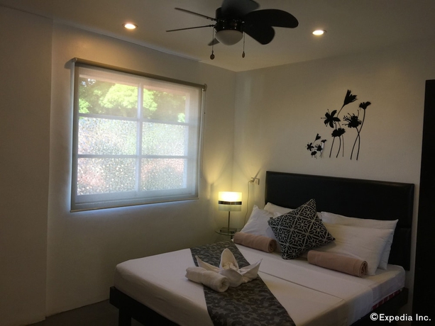 Imagen de la habitación del Hotel Micasa Lodge. Foto 8