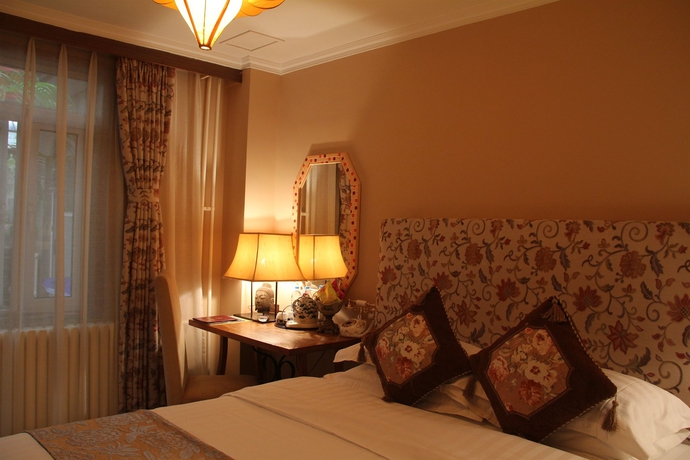Imagen de la habitación del Hotel Michaels House Beijing. Foto 5