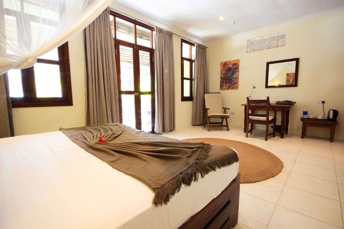 Imagen del bar/restaurante del Hotel Michamvi Sunset Bay. Foto 8