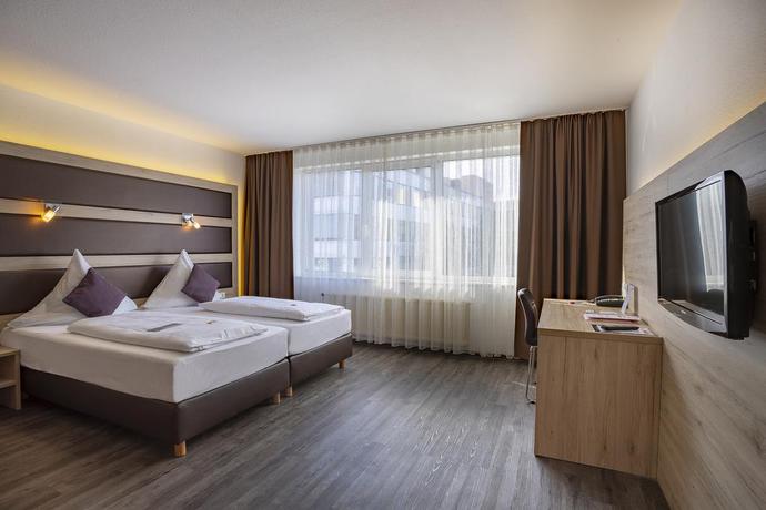 Imagen de la habitación del Hotel Michel Rüsselsheim Frankfurt Airport. Foto 9