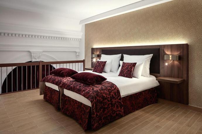 Imagen de la habitación del Hotel Michelangelo Grand Prague. Foto 4