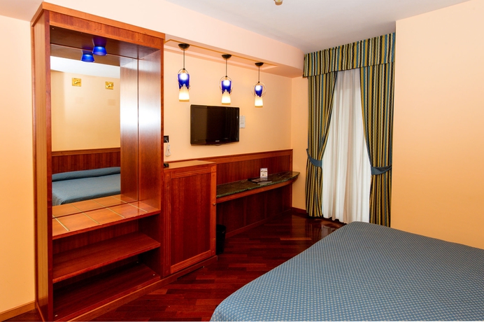 Imagen de la habitación del Hotel Michelangelo Palace. Foto 6