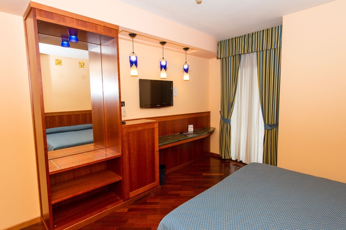 Imagen de la habitación del Hotel Michelangelo Palace. Foto 9