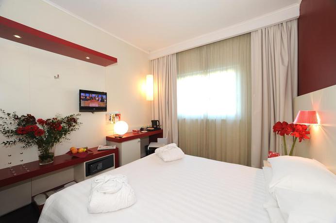 Imagen de la habitación del Hotel Michelino Bologna Fiera. Foto 3