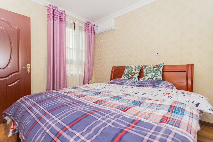 Imagen de la habitación del Hotel Mickey Wonderful Apartment. Foto 19