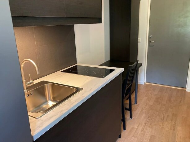 Imagen de la habitación del Hotel Micro Apartments. Foto 7