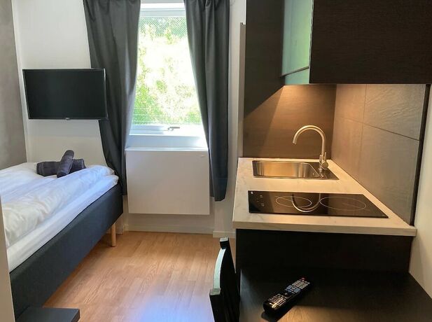 Imagen de la habitación del Hotel Micro Apartments. Foto 8
