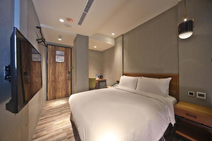 Imagen de la habitación del Hotel Micro, Taichung. Foto 20