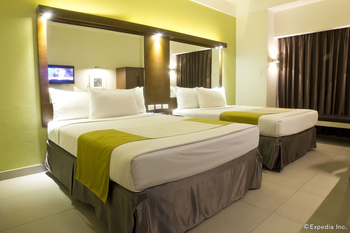 Imagen de la habitación del Hotel Microtel By Wyndham Acropolis. Foto 4