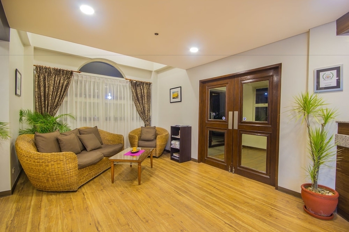 Imagen de los interiores del Hotel Microtel By Wyndham Batangas. Foto 19