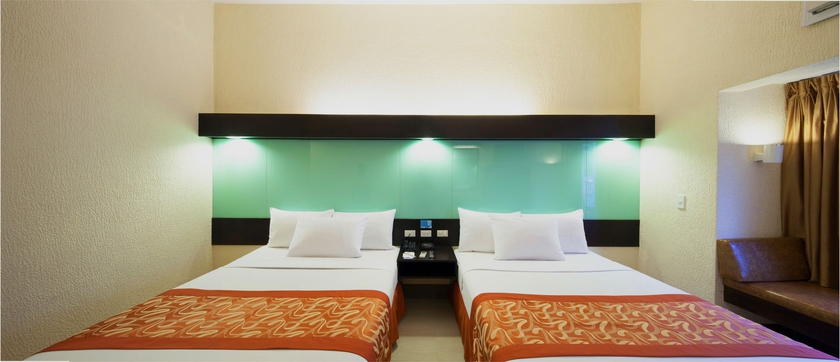 Imagen de la habitación del Hotel Microtel By Wyndham Boracay. Foto 7