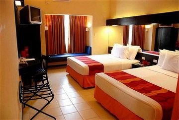 Imagen de la habitación del Hotel Microtel By Wyndham Davao. Foto 8