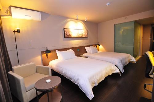 Imagen de la habitación del Hotel Microtel By Wyndham Kunming City Center. Foto 6