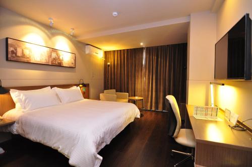 Imagen de la habitación del Hotel Microtel By Wyndham Kunming City Center. Foto 7