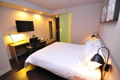 Imagen de la habitación del Hotel Microtel By Wyndham Kunming City Center. Foto 10