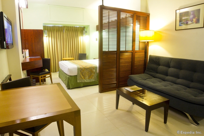 Imagen de la habitación del Hotel Microtel By Wyndham Mall Of Asia. Foto 6