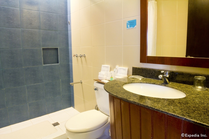 Imagen de la habitación del Hotel Microtel By Wyndham Mall Of Asia. Foto 10