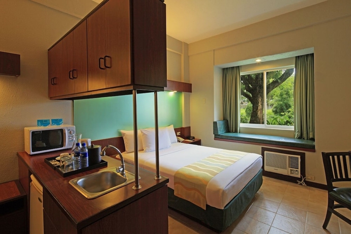Imagen de la habitación del Hotel Microtel By Wyndham Tarlac. Foto 13