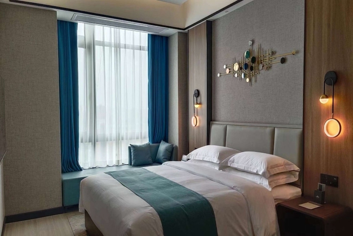 Imagen de la habitación del Hotel Microtel By Wyndham Xiangtan Tianyi. Foto 5