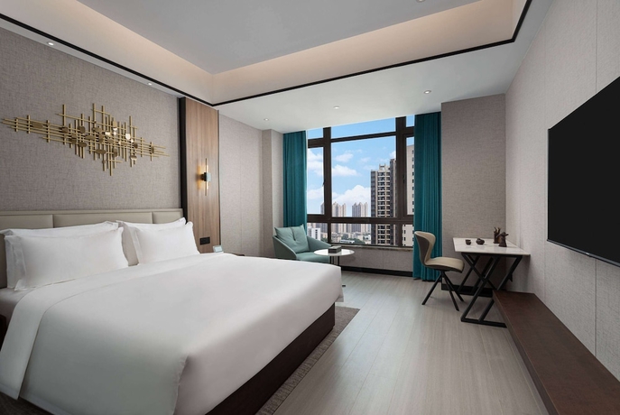 Imagen de la habitación del Hotel Microtel By Wyndham Xiangtan Tianyi. Foto 6