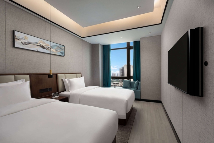 Imagen de la habitación del Hotel Microtel By Wyndham Xiangtan Tianyi. Foto 7